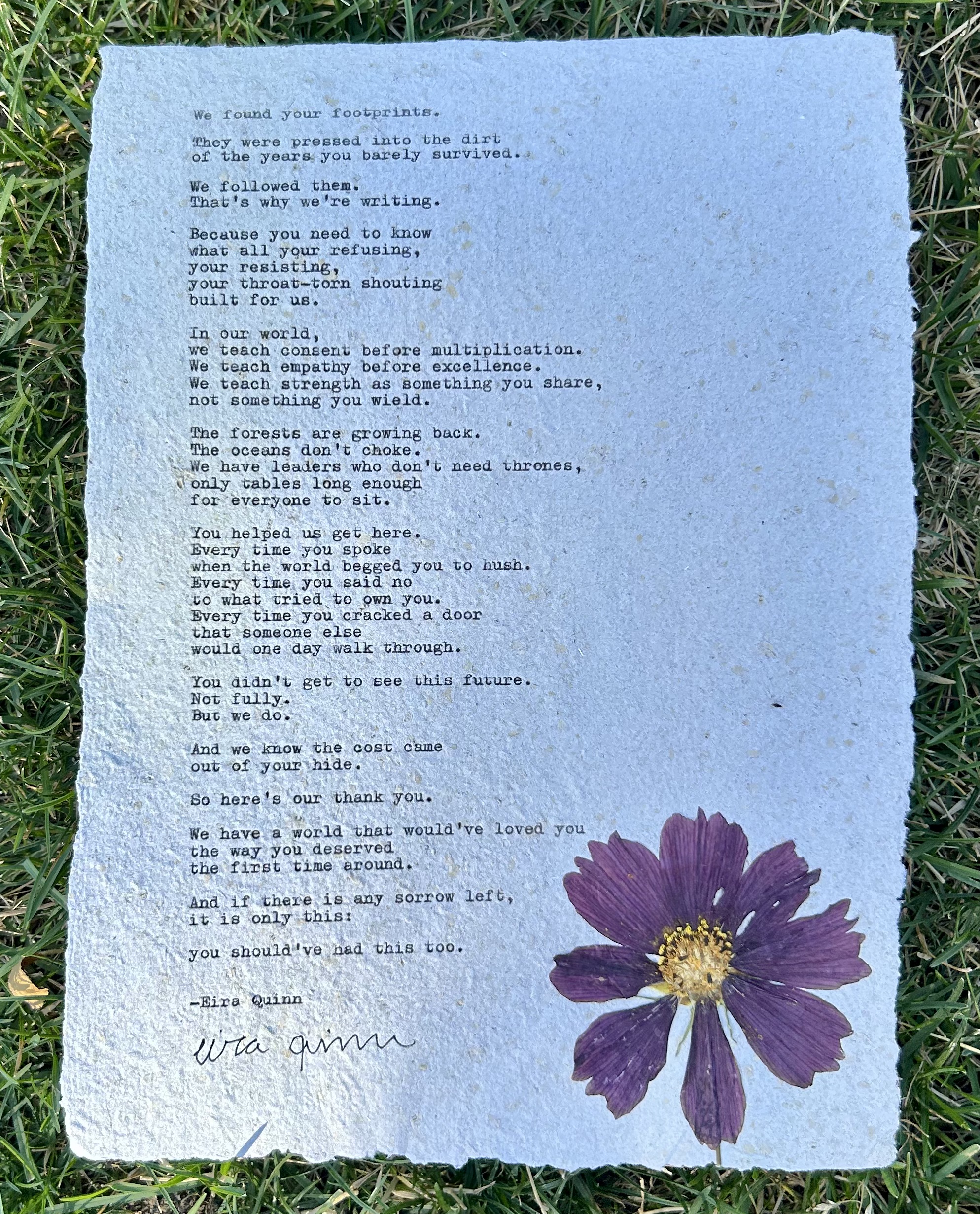 A Letter From the World You Made Possible typed on handmade paper with pressed flower
